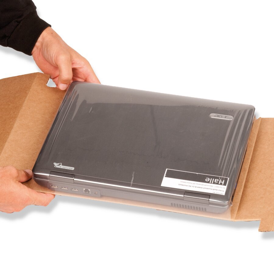 ... beide Seitenklappen an der Lngsseite sind nach unten geklappt und fixieren somit das Packgut.